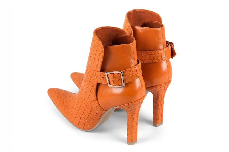 Dress ankle boots back buckles in apricot orange leather with high slim heels and tapered toe - Rear view
